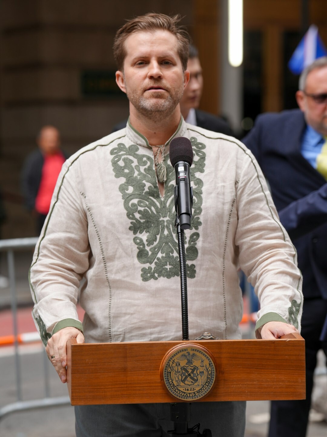 whistleblower at podium